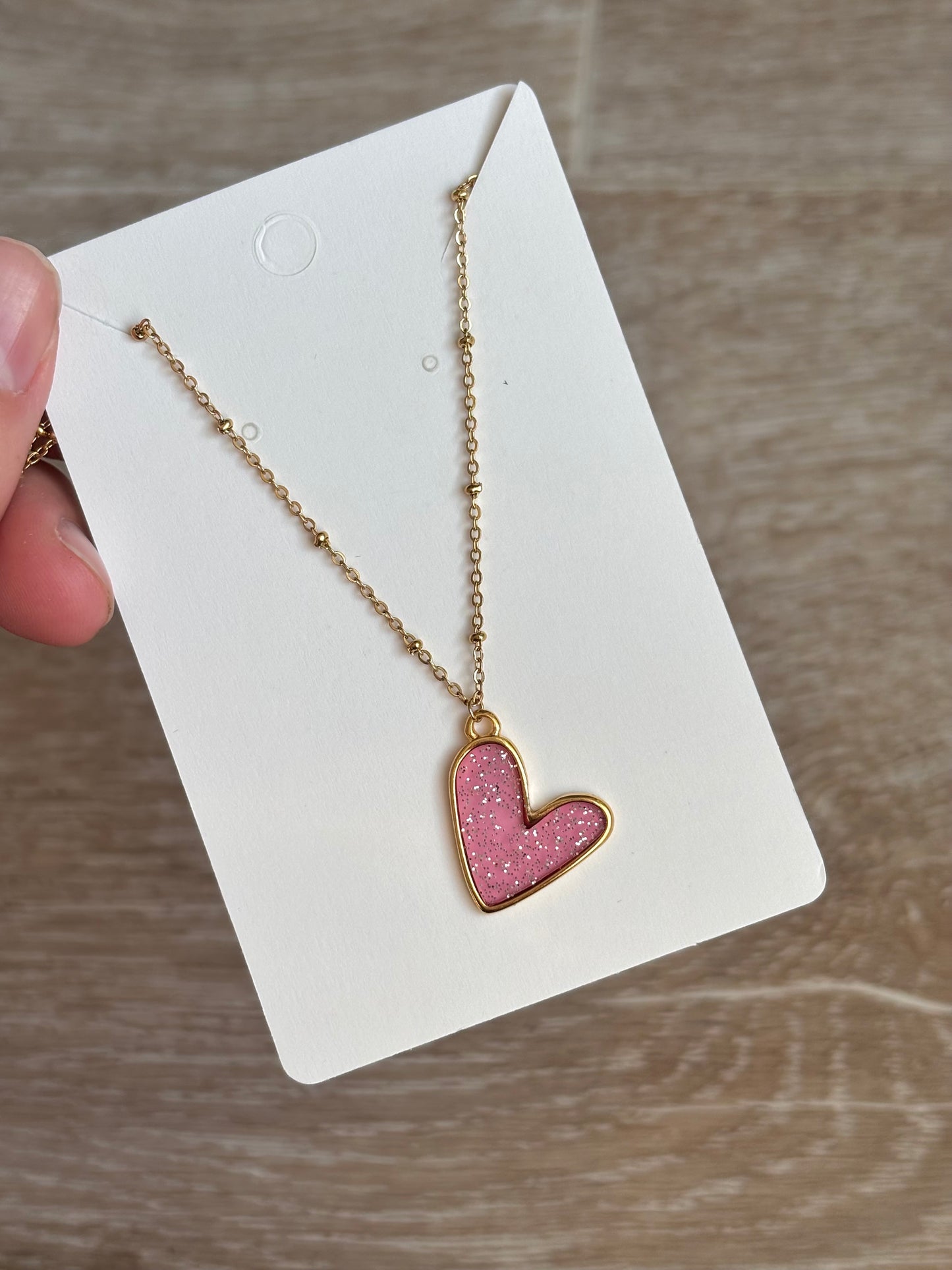Collier cœur rose pailleté