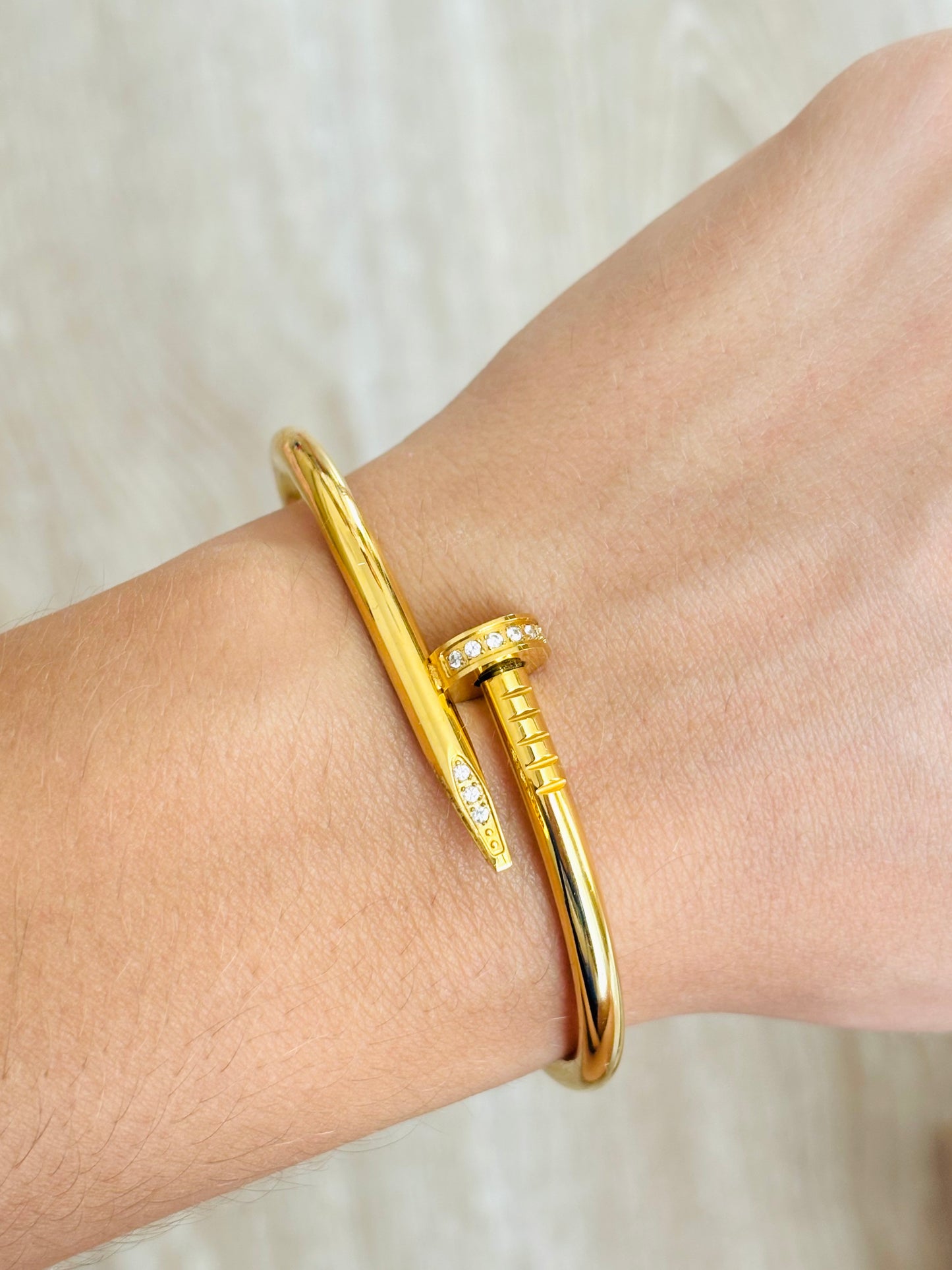 Bracelet clou doré