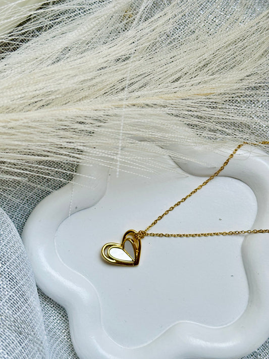 Fine gold necklace with mother-of-pearl heart pendant