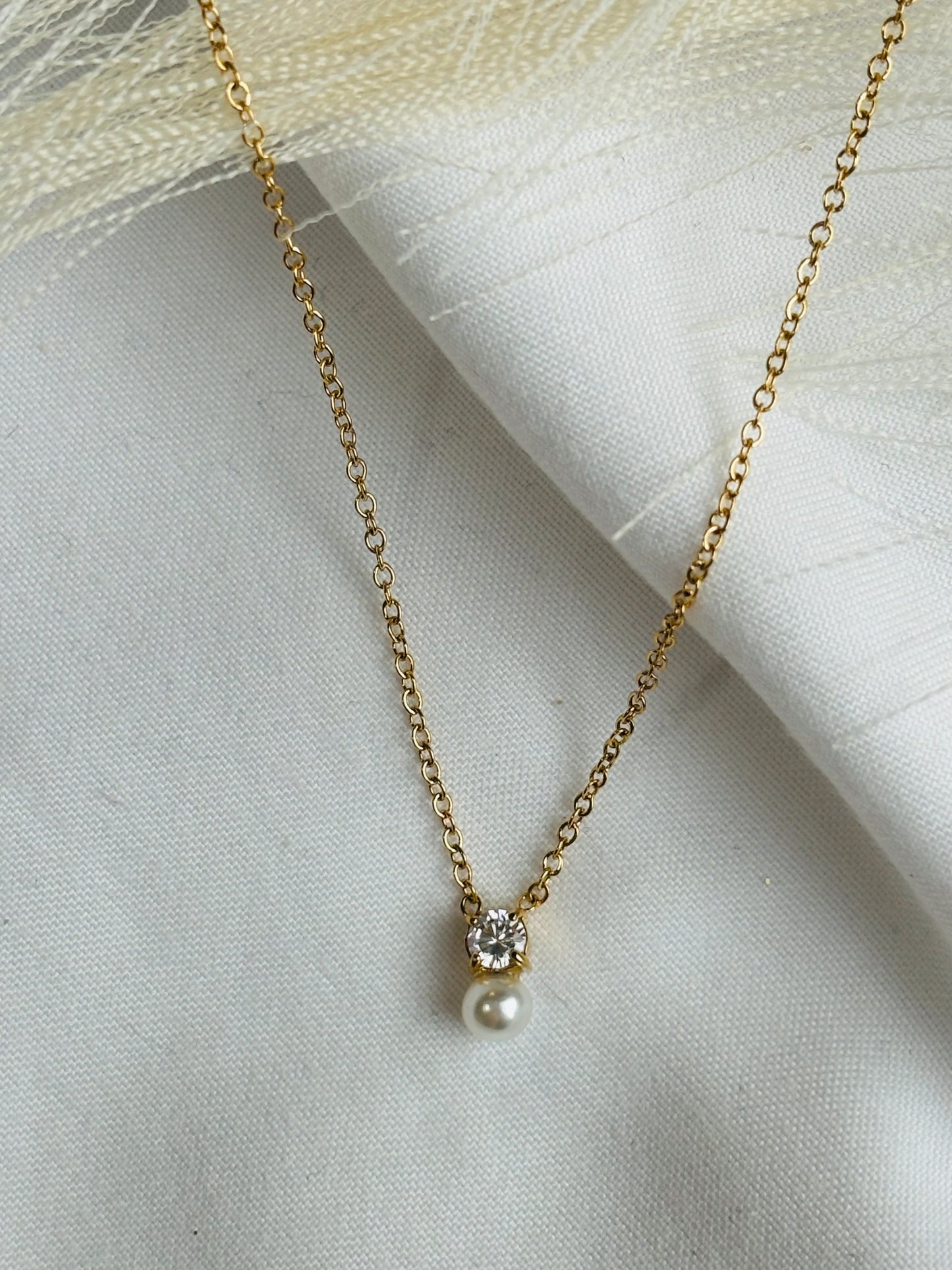 Pearl and rhinestone necklace